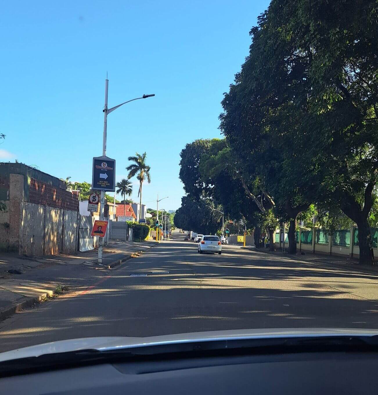 Drive right to the end... to the traffic lights. Turn right. 