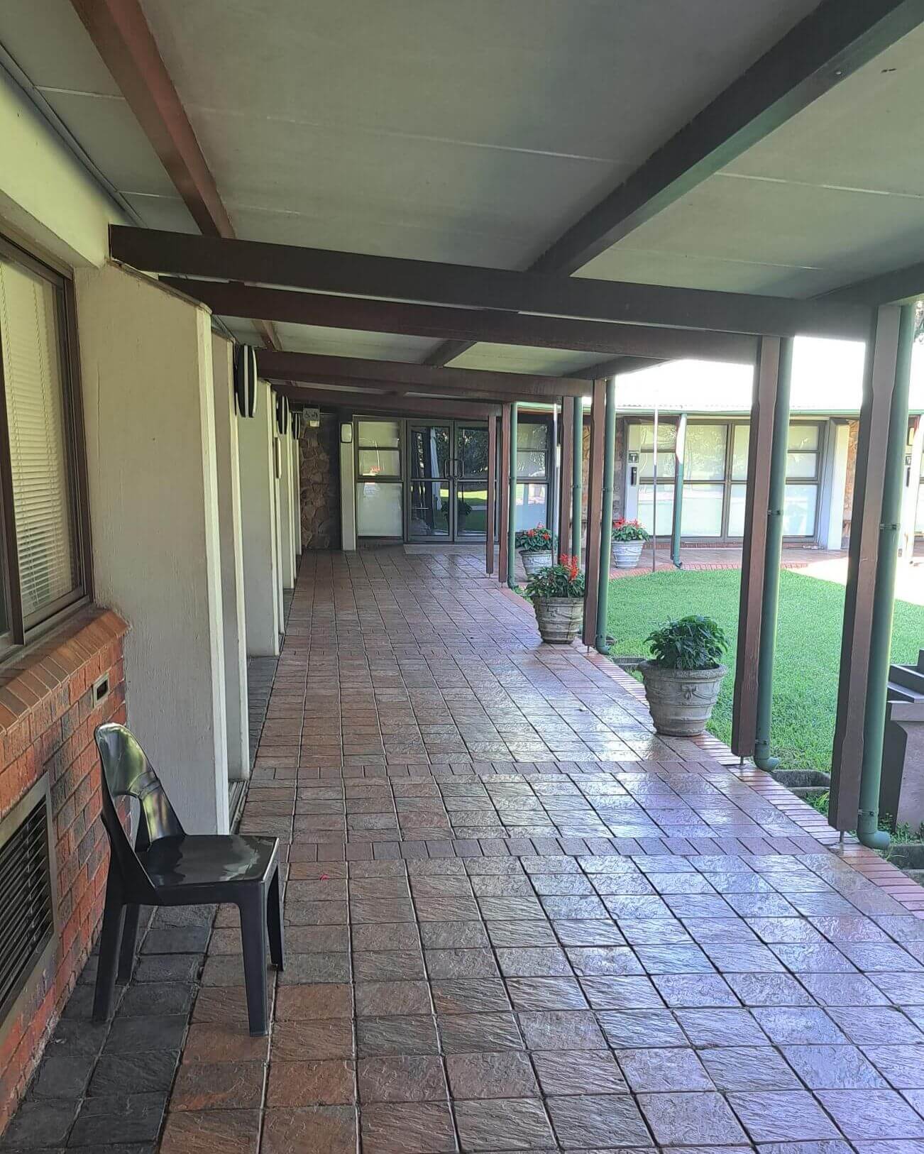 As you walk in, to the Left at the end of the passage, are the toilets. 